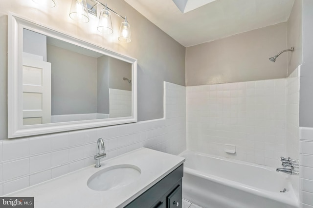 1004 N 67th St, Philadelphia, PA 19151 - bathroom with vanity, tile walls, and shower / bathtub combination