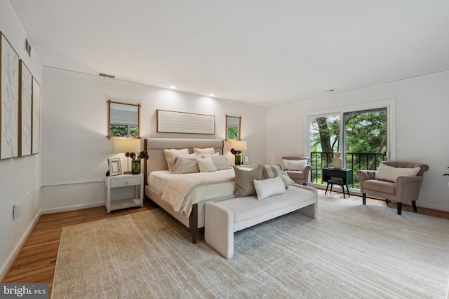 6 Roland Mews Unit R46, Baltimore, MD 21210 - bedroom with light wood-type flooring and baseboards