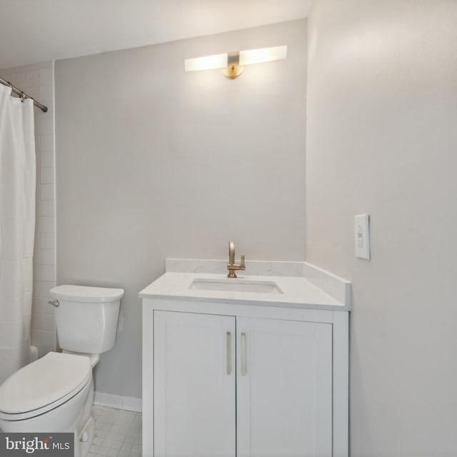 6 Roland Mews Unit R46, Baltimore, MD 21210 - full bathroom with vanity, toilet, curtained shower, tile patterned flooring, and baseboards
