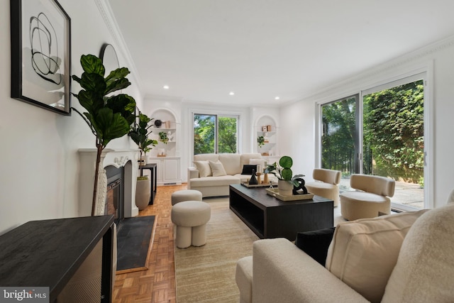 6 Roland Mews Unit R46, Baltimore, MD 21210 - living area featuring ornamental molding, healthy amount of natural light, built in shelves, a fireplace, and recessed lighting