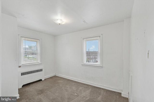 1500 Benner St, Philadelphia, PA 19149 - empty room featuring carpet floors, radiator, and baseboards