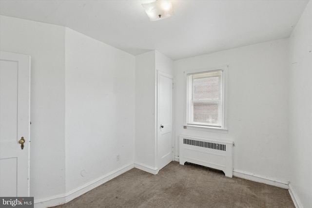 1500 Benner St, Philadelphia, PA 19149 - carpeted empty room with radiator and baseboards