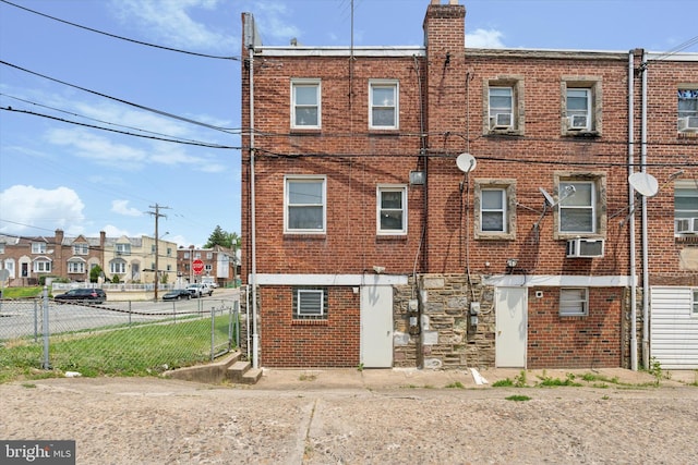 1500 Benner St, Philadelphia, PA 19149 - rear view of house with brick siding and a chimney
