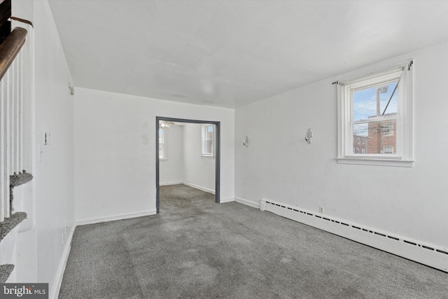 1500 Benner St, Philadelphia, PA 19149 - spare room with baseboard heating, carpet flooring, and baseboards