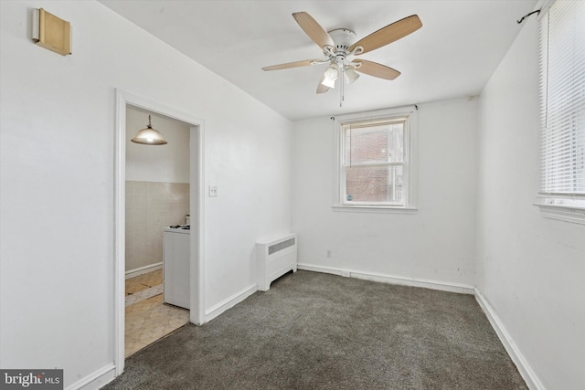 1500 Benner St, Philadelphia, PA 19149 - empty room with plenty of natural light, ceiling fan, radiator, and carpet flooring
