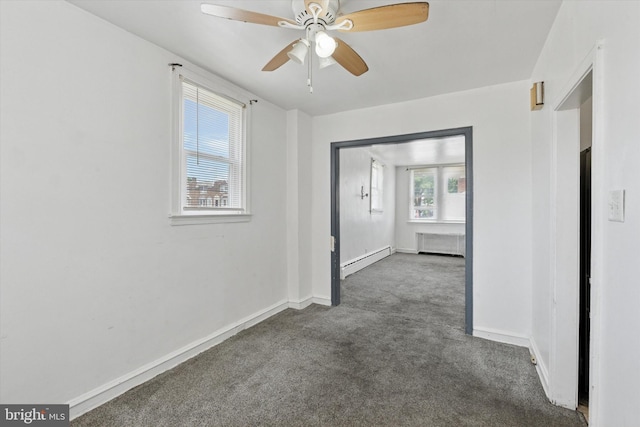 1500 Benner St, Philadelphia, PA 19149 - spare room featuring baseboard heating, dark carpet, baseboards, and ceiling fan
