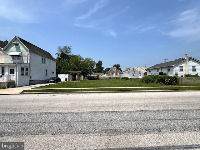 234 Erickson Ave Unit 28-31, Essington, PA 19029 - view of asphalt road featuring sidewalks and a residential view