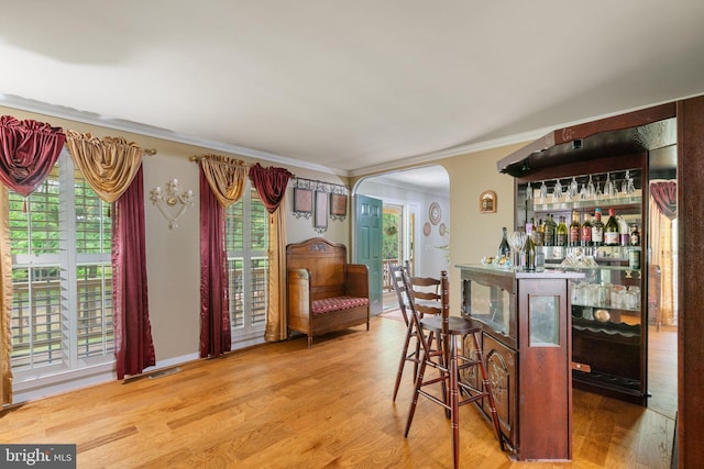 175 Mt Hope Church Rd, Stafford, VA 22554 - indoor dry bar with ornamental molding, wood finished floors, and arched walkways