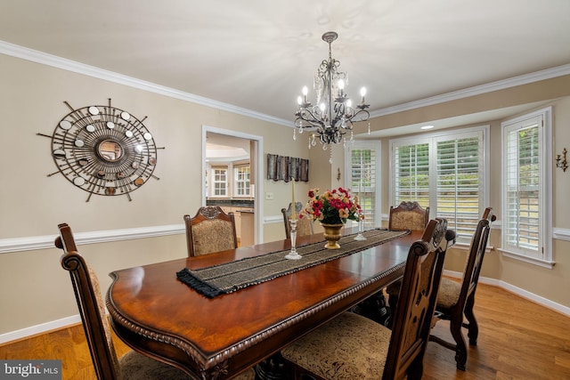 175 Mt Hope Church Rd, Stafford, VA 22554 - dining space with a chandelier, wood finished floors, and ornamental molding