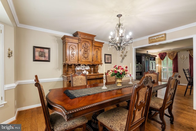 175 Mt Hope Church Rd, Stafford, VA 22554 - dining room featuring a chandelier, wood finished floors, and ornamental molding