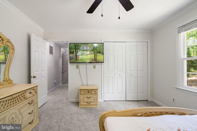 175 Mt Hope Church Rd, Stafford, VA 22554 - bedroom with light carpet, crown molding, a closet, and ceiling fan