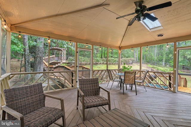 175 Mt Hope Church Rd, Stafford, VA 22554 - sunroom featuring ceiling fan, outdoor dining area, a skylight, and vaulted ceiling
