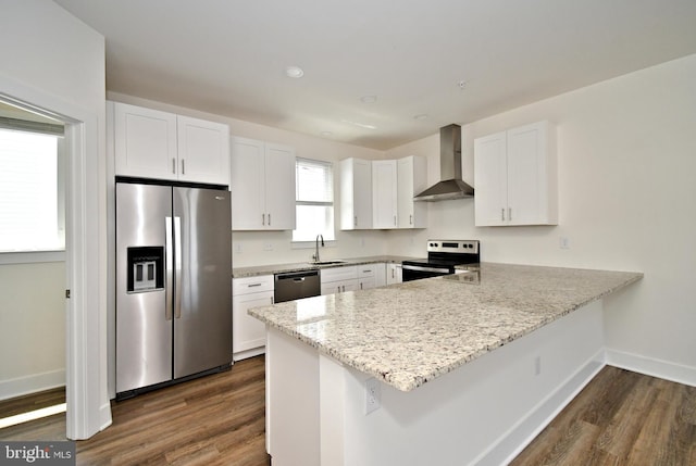 287 Yards Ct, Hatboro, PA 19040 - kitchen featuring stainless steel appliances, wall chimney exhaust hood, a sink, a peninsula, and dark wood finished floors