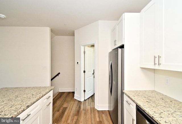 287 Yards Ct, Hatboro, PA 19040 - kitchen featuring freestanding refrigerator, wood finished floors, white cabinets, and light stone countertops