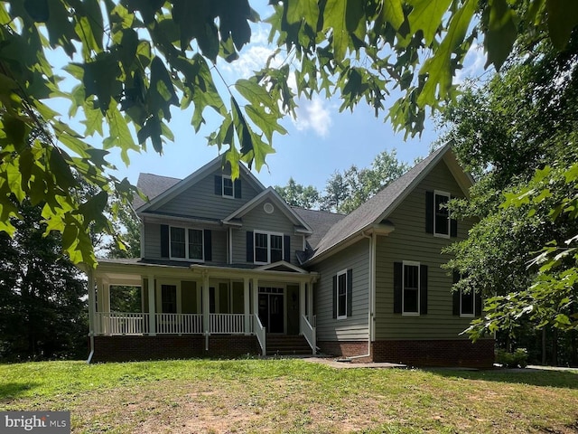9937 Talley Rd, Spotsylvania, VA 22553 - view of front of property with covered porch, a front yard, and roof with shingles