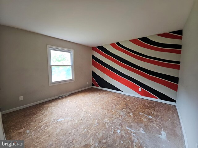 239 Grove St, Bridgeton, NJ 08302 - spare room featuring baseboards