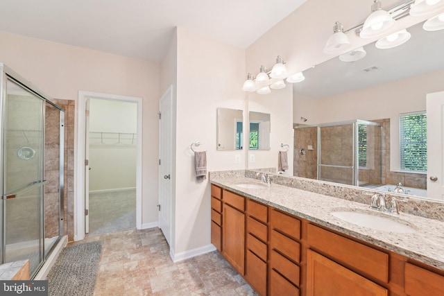 7912 Meridian Dr, Pasadena, MD 21122 - full bathroom with a shower stall, double vanity, a walk in closet, and a bath
