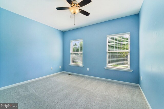 7912 Meridian Dr, Pasadena, MD 21122 - spare room featuring carpet flooring and a ceiling fan