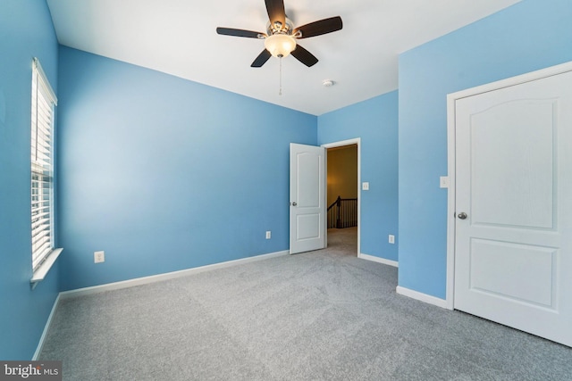 7912 Meridian Dr, Pasadena, MD 21122 - unfurnished bedroom featuring carpet flooring and ceiling fan