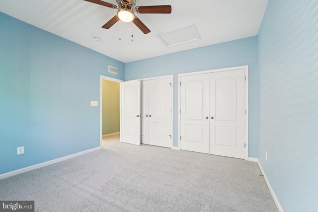 7912 Meridian Dr, Pasadena, MD 21122 - unfurnished bedroom featuring attic access, two closets, carpet flooring, and a ceiling fan