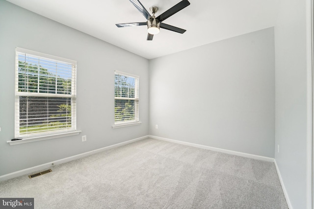 7912 Meridian Dr, Pasadena, MD 21122 - carpeted spare room with baseboards and a ceiling fan