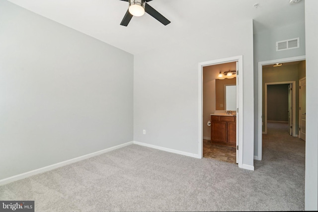 7912 Meridian Dr, Pasadena, MD 21122 - unfurnished bedroom featuring carpet floors, ensuite bath, and ceiling fan