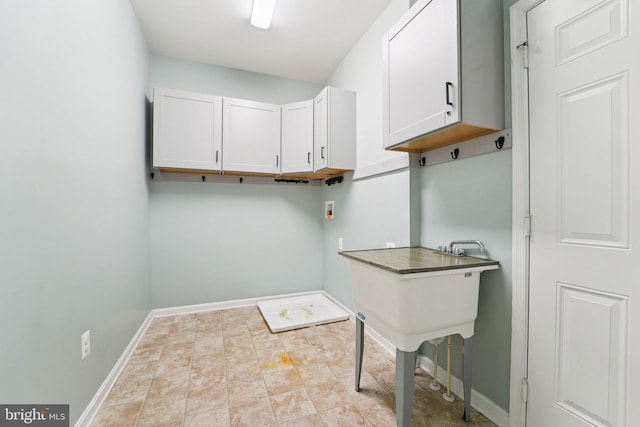 7912 Meridian Dr, Pasadena, MD 21122 - laundry room with cabinet space and washer hookup