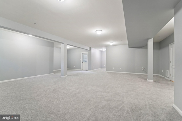 7912 Meridian Dr, Pasadena, MD 21122 - finished below grade area featuring light carpet and baseboards