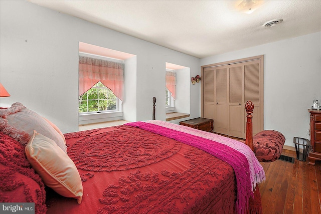 13220 Bank St, Bishopville, MD 21813 - bedroom featuring hardwood / wood-style flooring, a closet, and baseboards