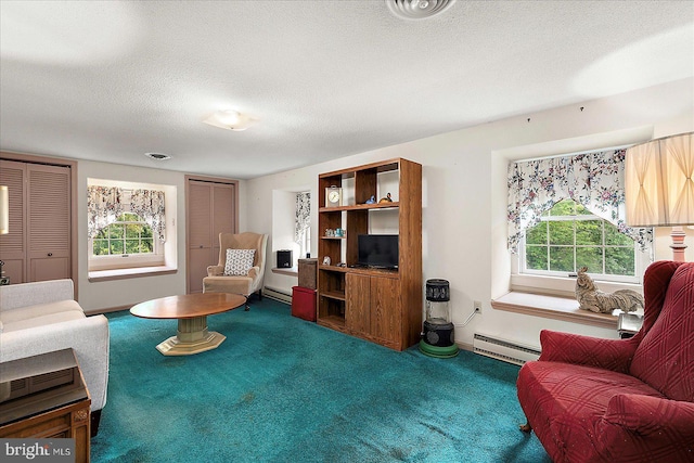13220 Bank St, Bishopville, MD 21813 - carpeted living room featuring a baseboard radiator, a textured ceiling, and baseboards