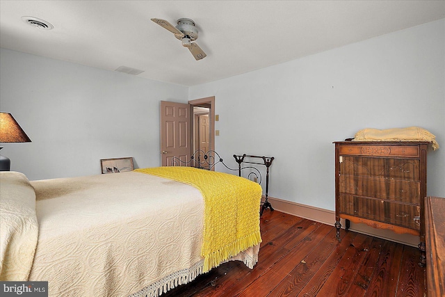 13220 Bank St, Bishopville, MD 21813 - bedroom featuring hardwood / wood-style floors, ceiling fan, and baseboards