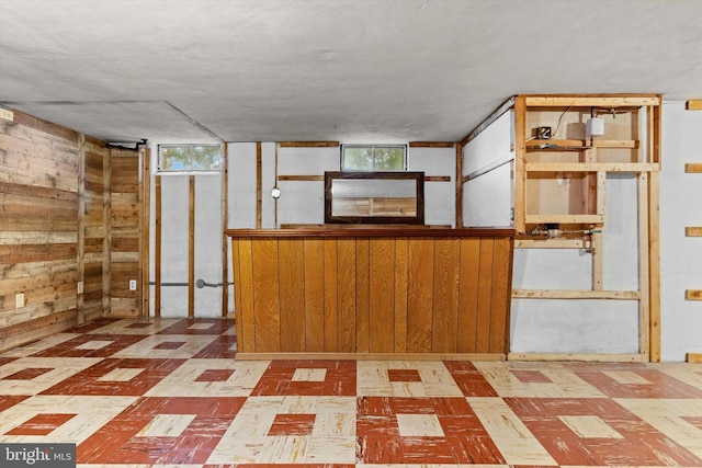 3415 E Market St, York, PA 17402 - kitchen with tile patterned floors and wooden walls
