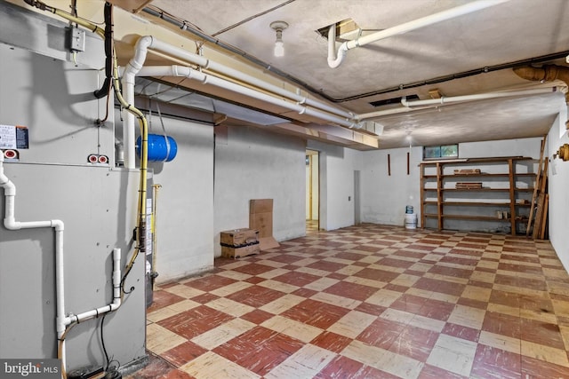 3415 E Market St, York, PA 17402 - below grade area with tile patterned floors and heating unit