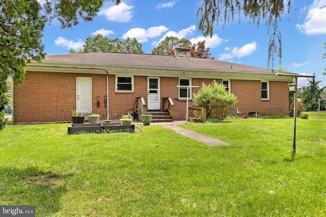 3415 E Market St, York, PA 17402 - view of front of property with a front yard and brick siding