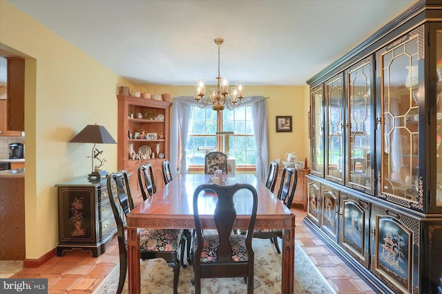 74 Acker Rd, Newport, PA 17074 - dining space featuring a chandelier and baseboards