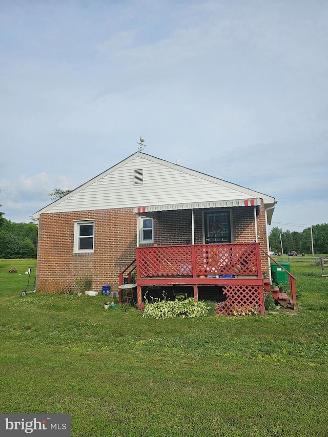 36652 Woodbush Dr, Bushwood, MD 20618 - back of property featuring a yard and brick siding