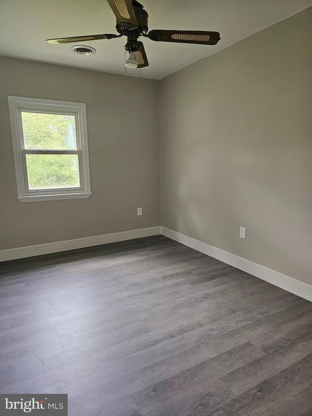 36652 Woodbush Dr, Bushwood, MD 20618 - empty room featuring a ceiling fan and dark wood-style flooring