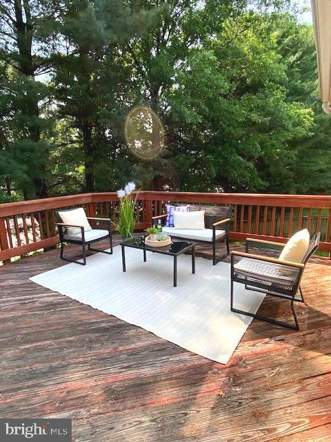 2 Raindrop Cir, Reisterstown, MD 21136 - wooden deck featuring an outdoor hangout area