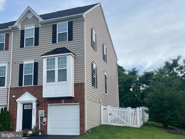 5771 Barts Way, Frederick, MD 21704 - view of property featuring brick siding and an attached garage