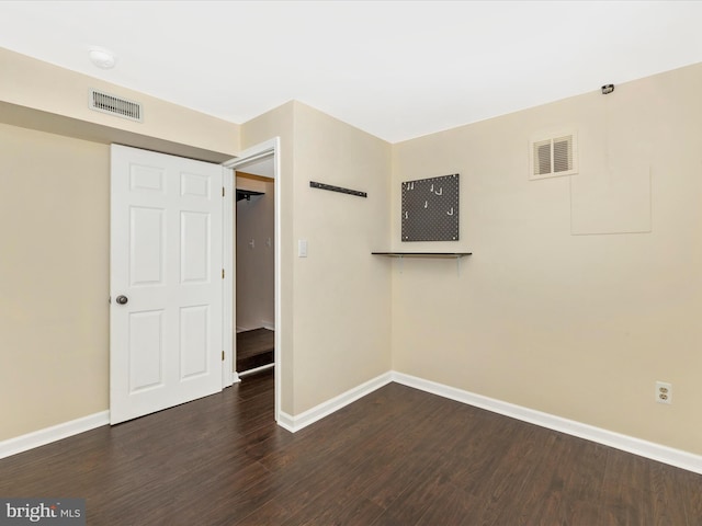 6848 Whistling Swan Way, New Market, MD 21774 - unfurnished bedroom with baseboards and dark wood finished floors