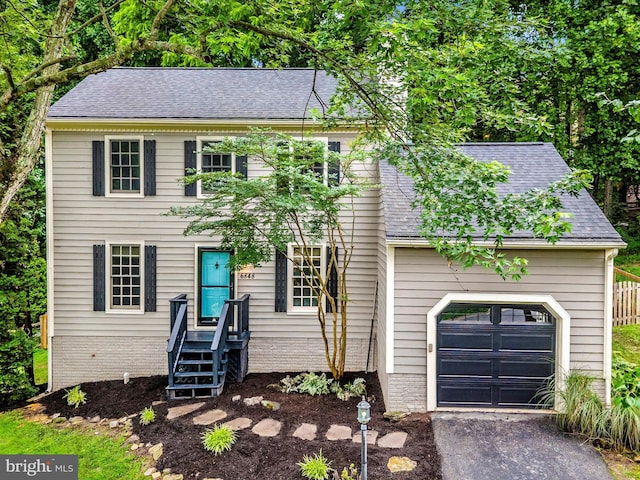 6848 Whistling Swan Way, New Market, MD 21774 - colonial inspired home with a shingled roof, asphalt driveway, and a garage