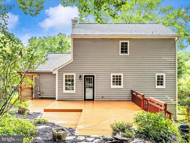6848 Whistling Swan Way, New Market, MD 21774 - rear view of property with a chimney, a shingled roof, and a wooden deck