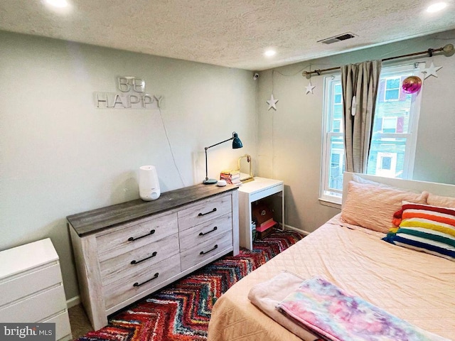13533 Demetrias Way, Germantown, MD 20874 - bedroom featuring a textured ceiling, recessed lighting, and dark colored carpet