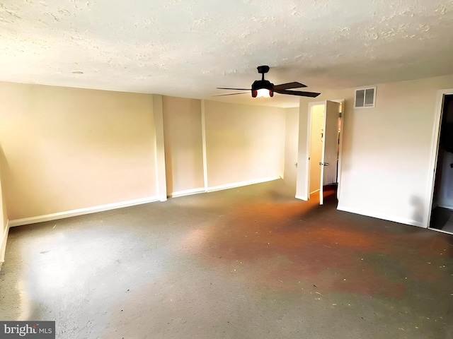 13533 Demetrias Way, Germantown, MD 20874 - unfurnished room with concrete floors, ceiling fan, and a textured ceiling