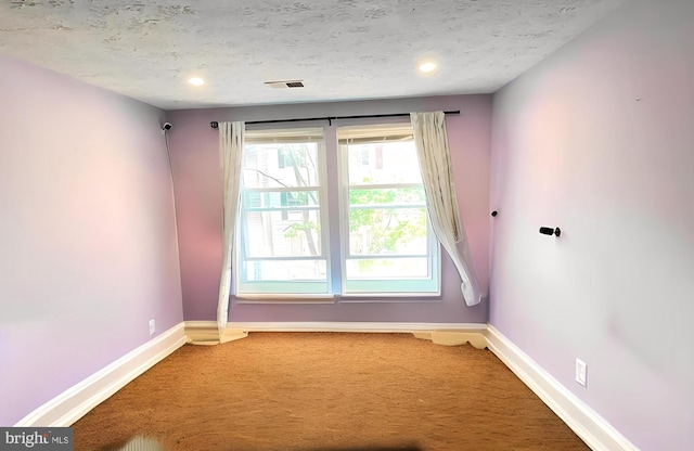 13533 Demetrias Way, Germantown, MD 20874 - carpeted empty room with a textured ceiling and recessed lighting