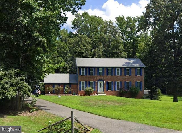 3028 Bramblewood Ct, Waldorf, MD 20603 - colonial home featuring a front lawn and brick siding