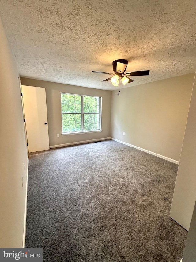 4850 Magpie Ln, Waldorf, MD 20603 - spare room with ceiling fan, a textured ceiling, carpet, and baseboards