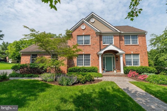 2440 Saddlebrook Rd, Macungie, PA 18062 - view of front of house with brick siding and a front yard