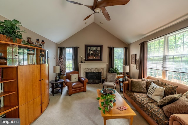 2440 Saddlebrook Rd, Macungie, PA 18062 - living room with a ceiling fan, plenty of natural light, light carpet, a tile fireplace, and lofted ceiling