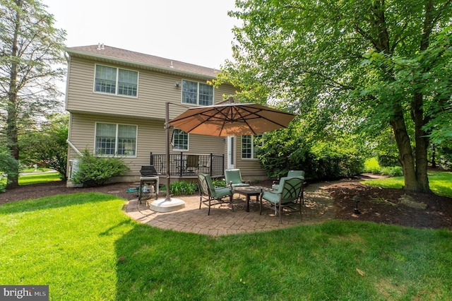 2440 Saddlebrook Rd, Macungie, PA 18062 - back of house featuring a patio and a lawn